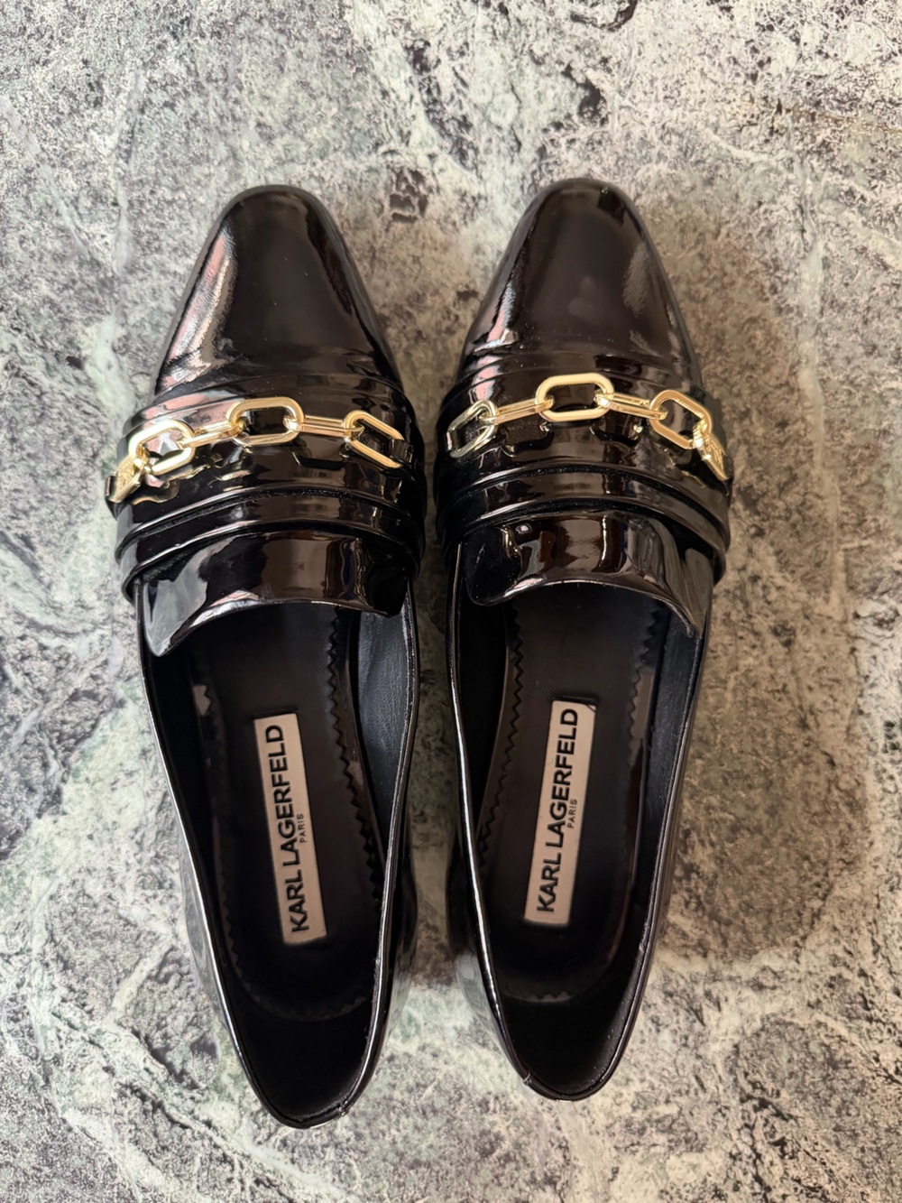 Stuart Weitzman Black Patent Nikki Loafers with Gold Chain Accent